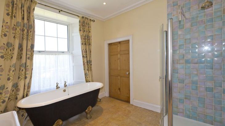 The ensuite bathroom with french bath